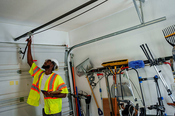 Professional Garage Door Panel Replacement technician working in Sharon, MS